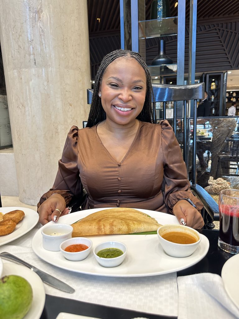 india travel food guide Black girl eating indian food
